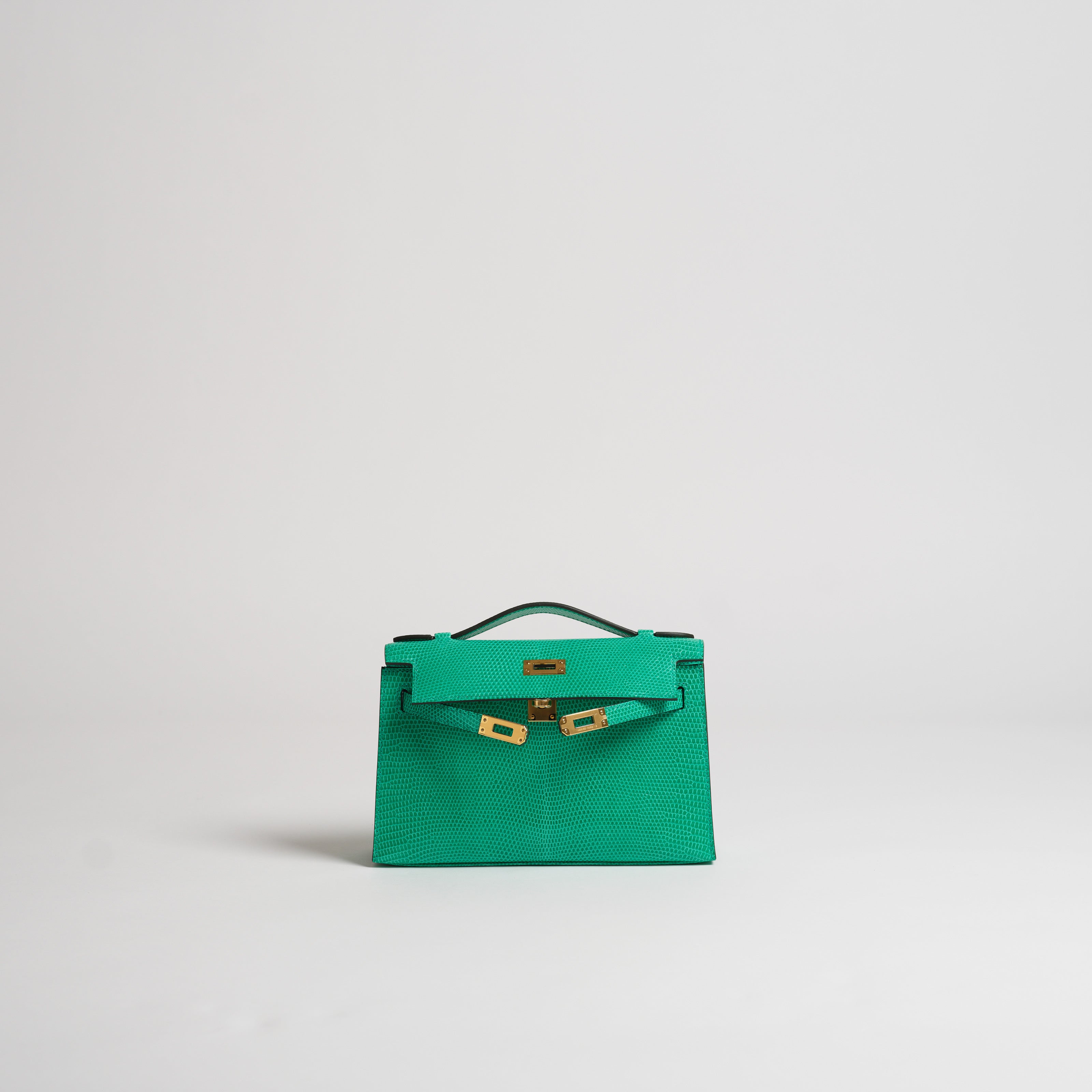 Hermès mini Kelly Pochette vert menthe lizard gold hardware