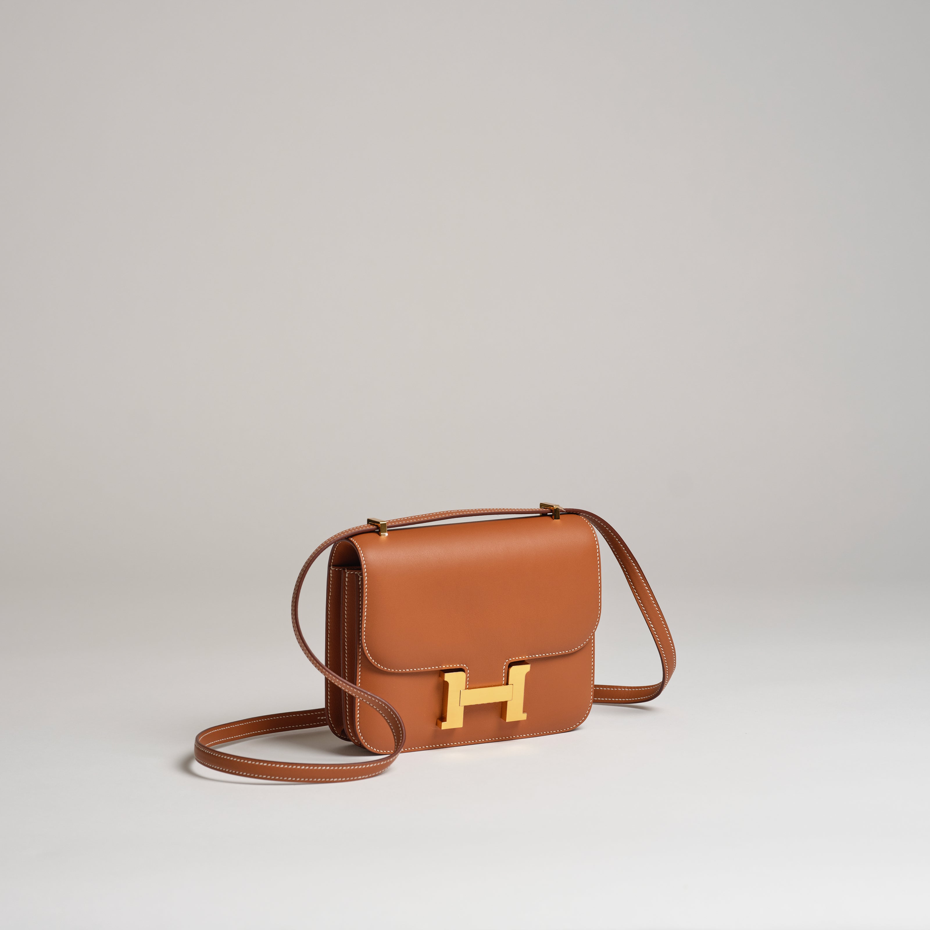 Hermès 18cm Mini Constance gold swift gold hardware