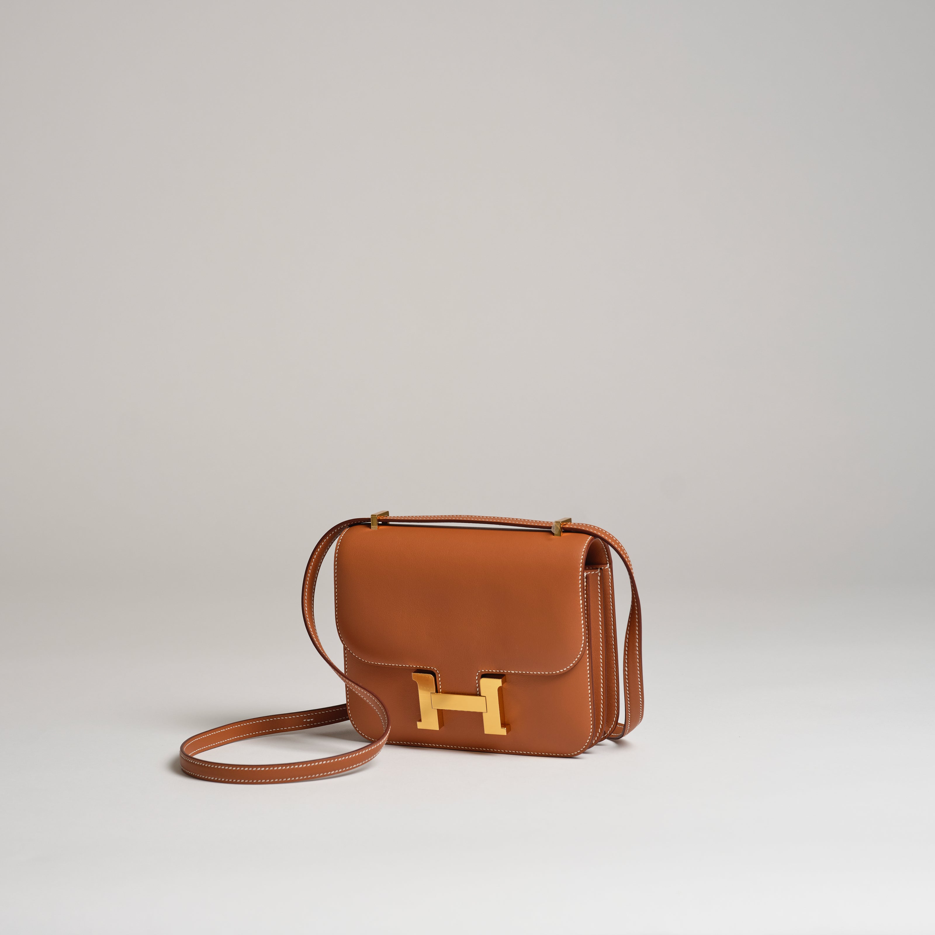 Hermès 18cm Mini Constance gold swift gold hardware