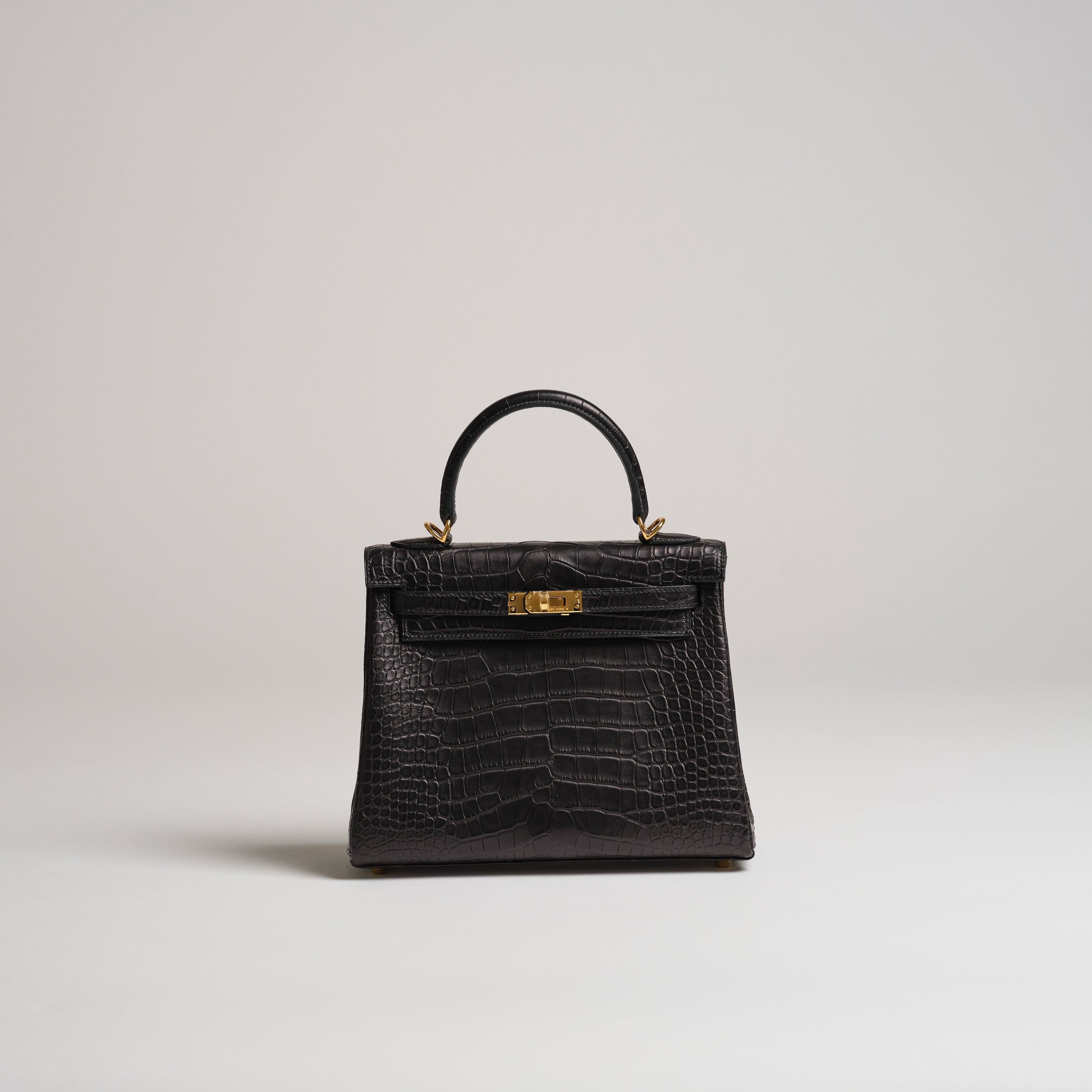Hermès 25cm Kelly Retourne black matt alligator gold hardware