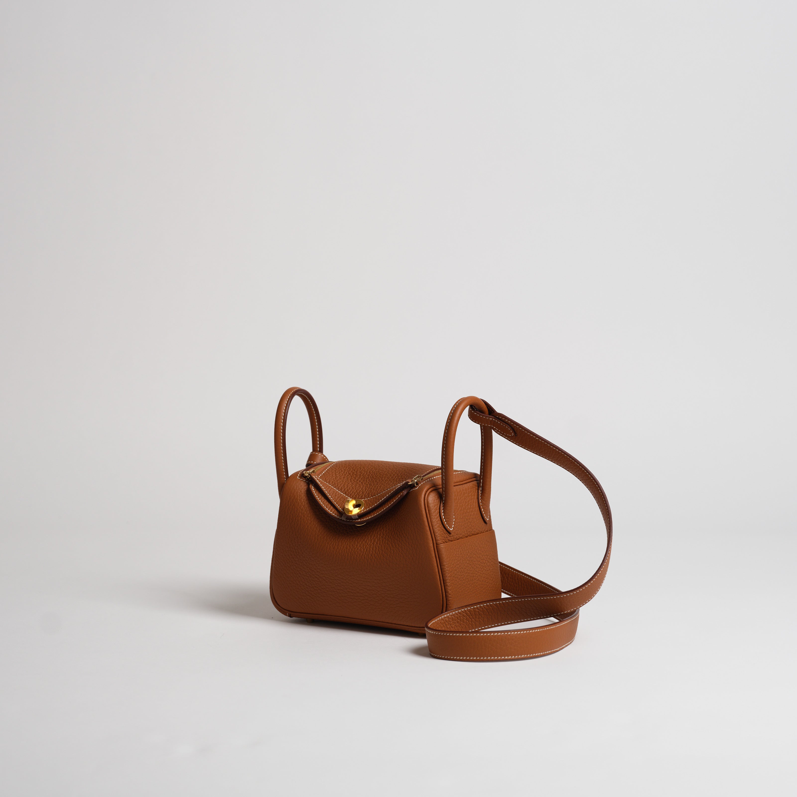 Hermès Mini Lindy gold clemence gold hardware