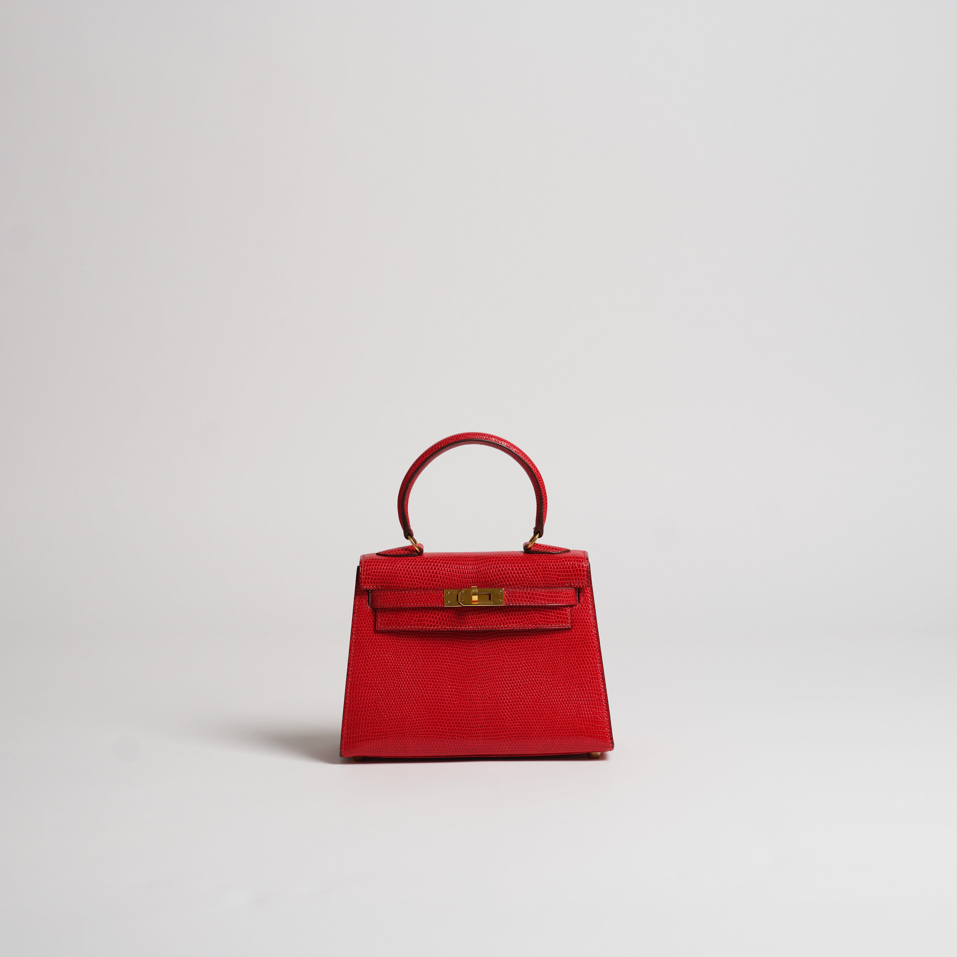 Vintage Hermès 20cm Kelly Sellier rouge vif lizard gold hardware