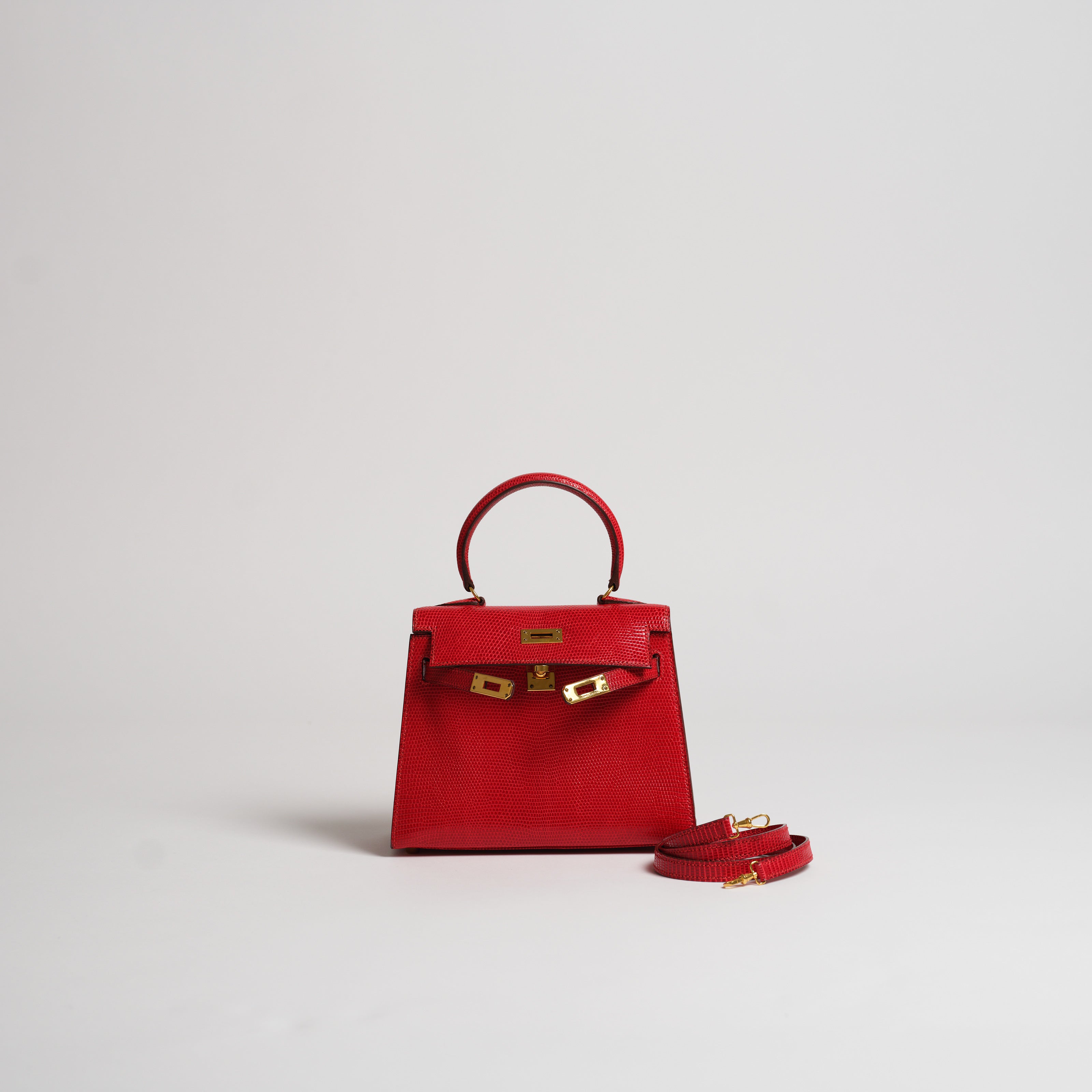 Vintage Hermès 20cm Kelly Sellier rouge vif lizard gold hardware