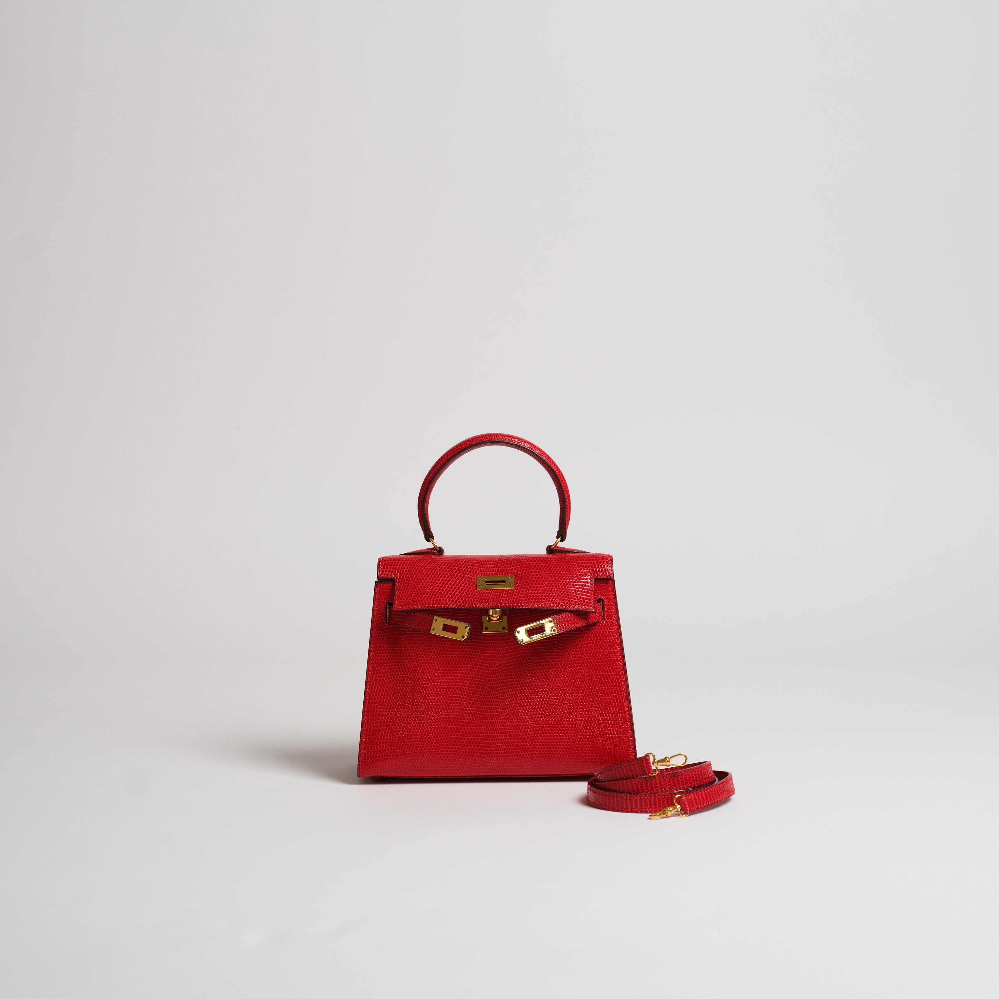 Vintage Hermès 20cm Kelly Sellier rouge vif lizard gold hardware