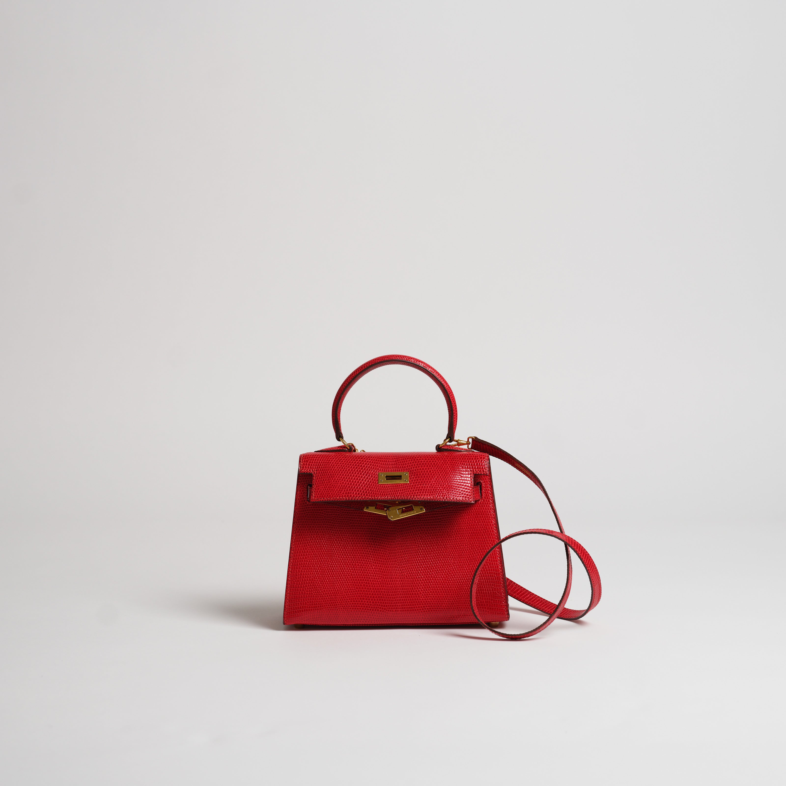 Vintage Hermès 20cm Kelly Sellier rouge vif lizard gold hardware