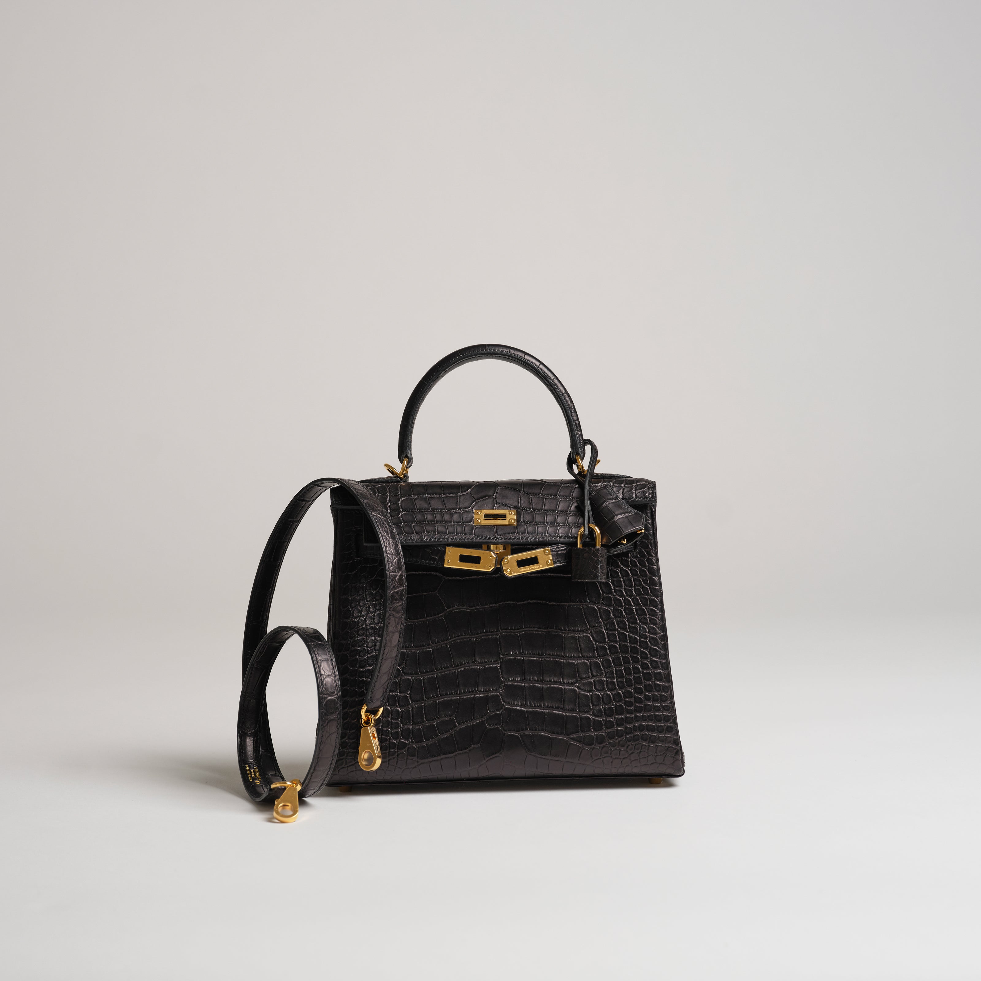 Hermès 25cm Kelly Retourne black matt alligator gold hardware